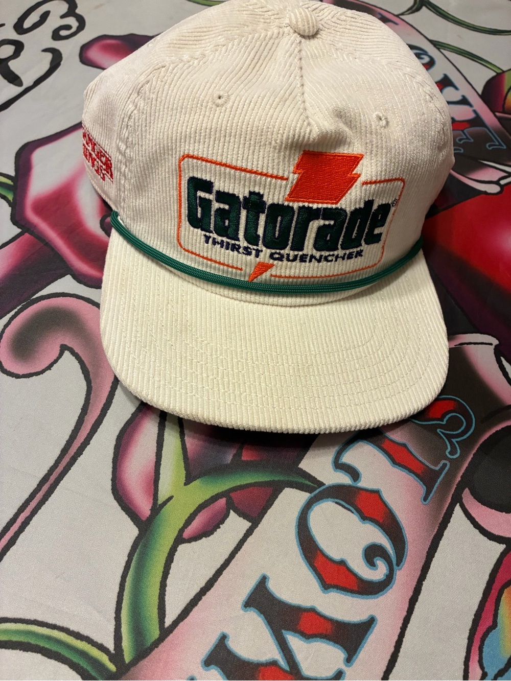 Netflix White Corduroy Hat with Green and Orange Gatorade Logo